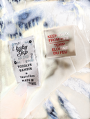 Träger-Kleid mit Batikmusterin Creme und Dunkelblau Gr.128 | GAP