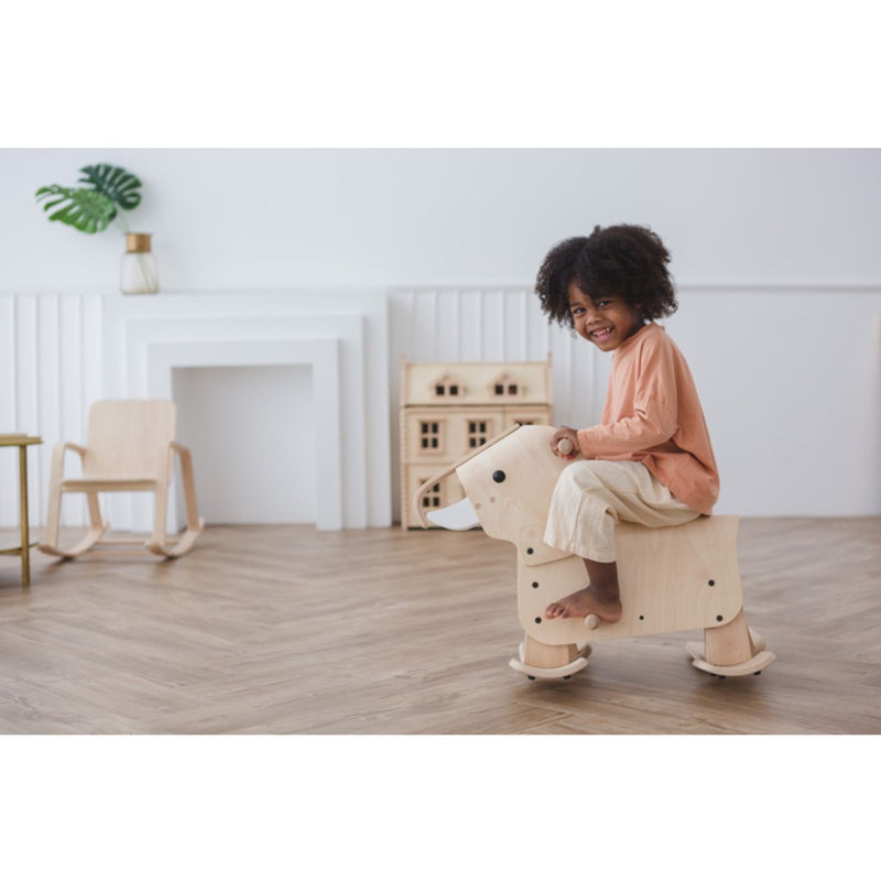 Kid playing PlanToys Walking Elephant