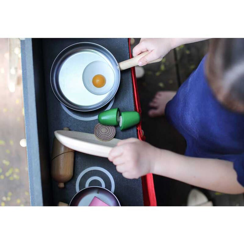 Kid playing PlanToys Play Center