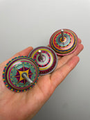 Hüpfkreisel mit Feder