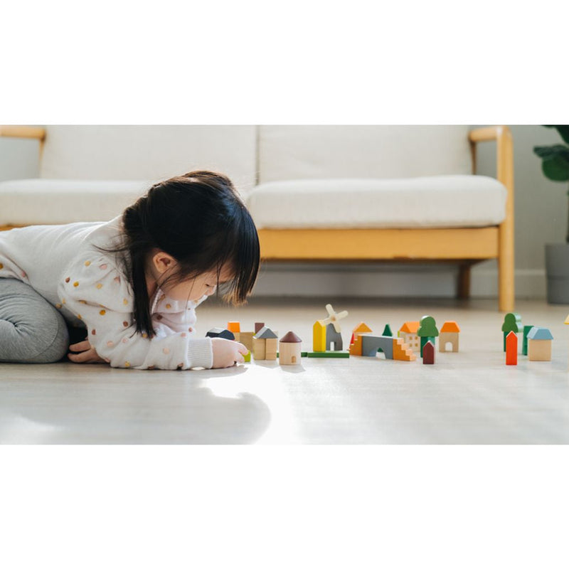 Kid playing PlanToys Countryside Blocks