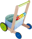 HABA 6432 - Lauflernwagen Farbenspaß, Lauflernhilfe aus Holz und Textil mit bunten Spielelementen, Transportfach für Spielsachen, Bremse und Gummirädern, ab 10 Monaten