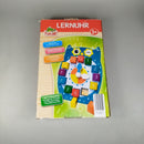 Playland Lernuhr aus Holz ab 3 Jahre