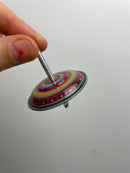 Hüpfkreisel mit Feder