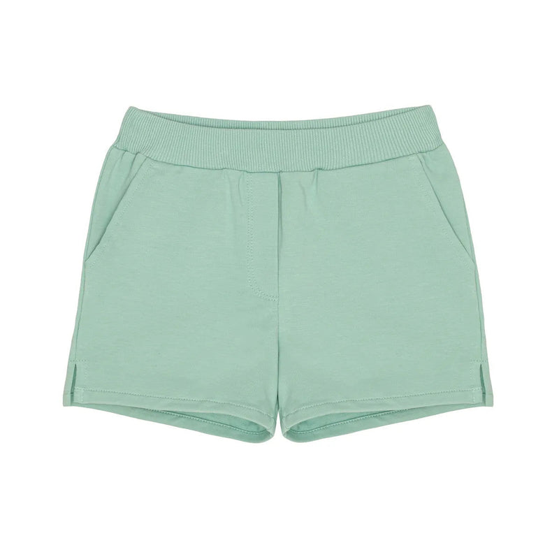 Little Hedonist organic cotton shorts with side pockets and splits for boys and girls in Neptune Green