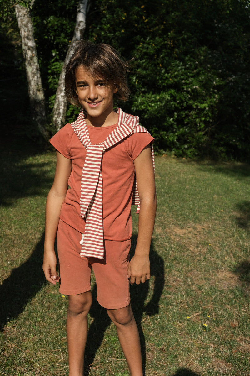 Little Hedonist super comfy organic surfer shorts in Apricot Brandy made from our softest organic cotton. Sustainable kids clothing for boys and girls.