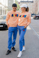 CHIO_MI_Premium_Partner Outfit_Sweatshirts and Partnerpants_-_organic_cotton_-_peach_coral with LOVE embroidery