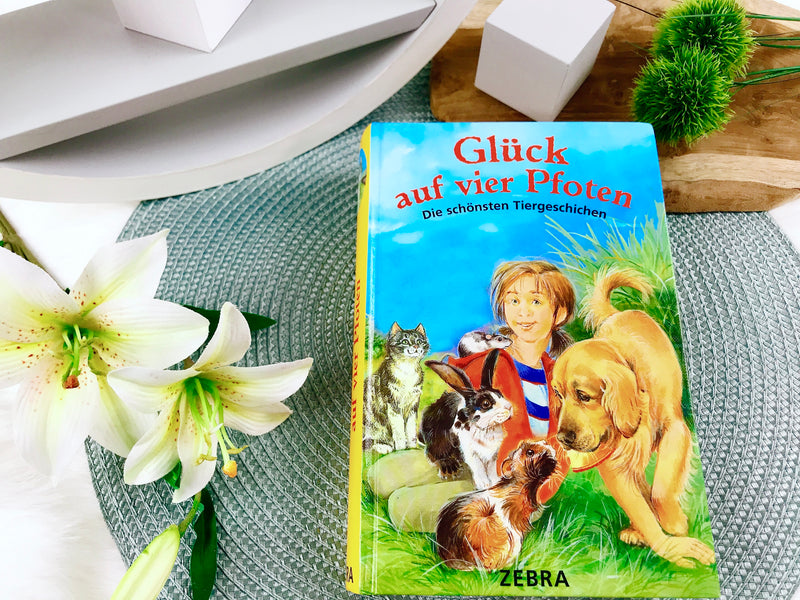 book "Happiness on four paws. The most beautiful animal stories"