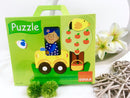 Goula wooden puzzle, 9 pieces, girl with car