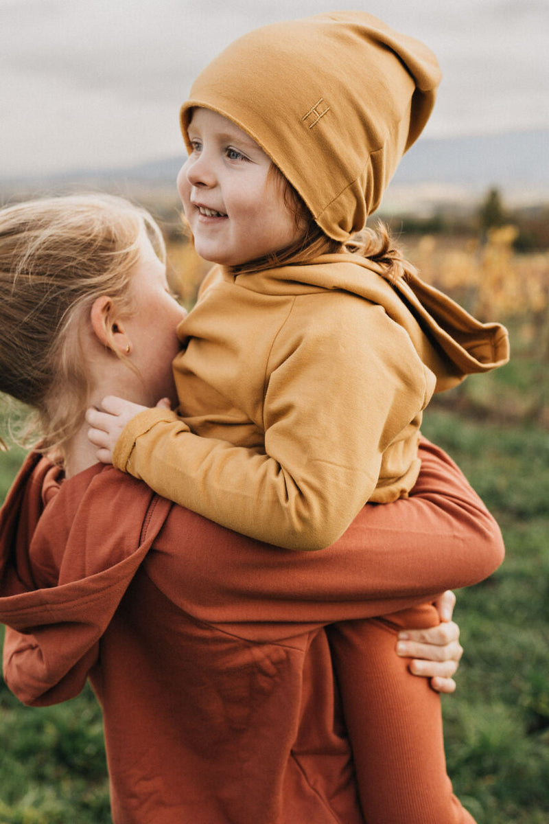 Organic cotton beanie, brushed inside for comfort and warmth, in Amber Gold