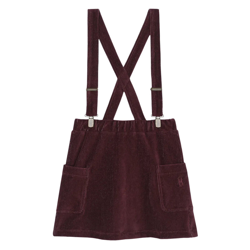 Little Hedonist comfortable, yet fancy, wine-colored dress with suspenders, to be worn for any occasion. Organic kids fashion.