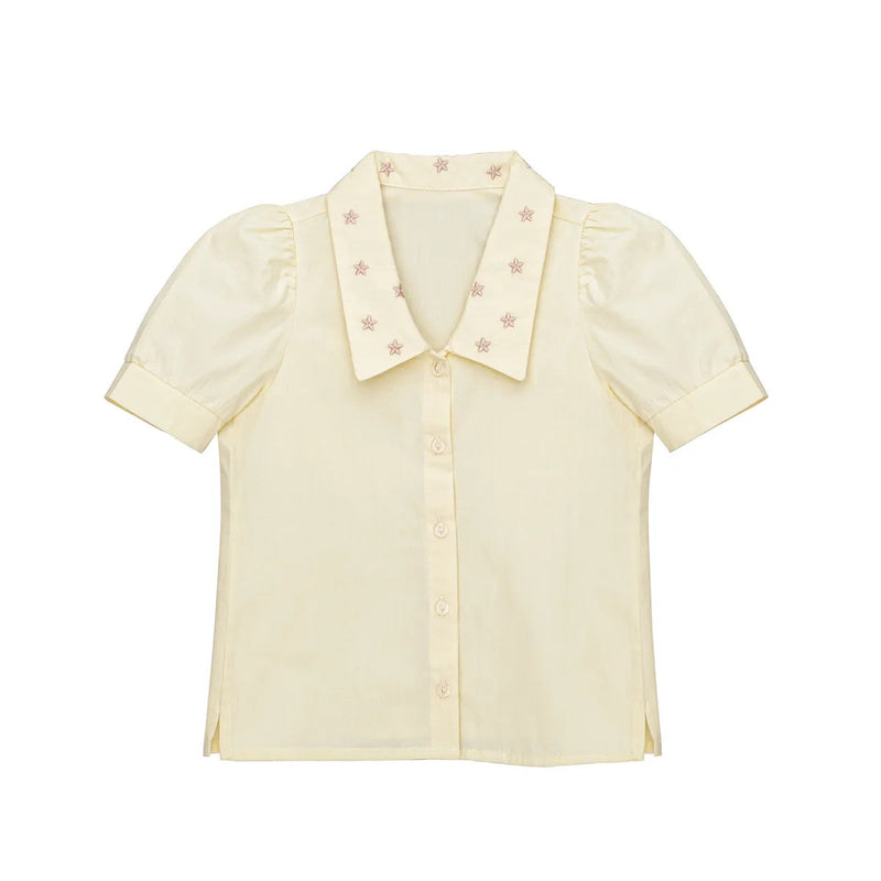 Little Hedonist puff sleeve blouse in Bleached Sand for girls. This button down shirt is made from organic cotton. Sustainable kids clothing.