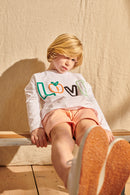 Enno shorts in grapefruit pink für Kinder