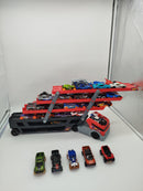 Hot Wheels Modellautos Set – Autotransporter & 44 Fahrzeuge