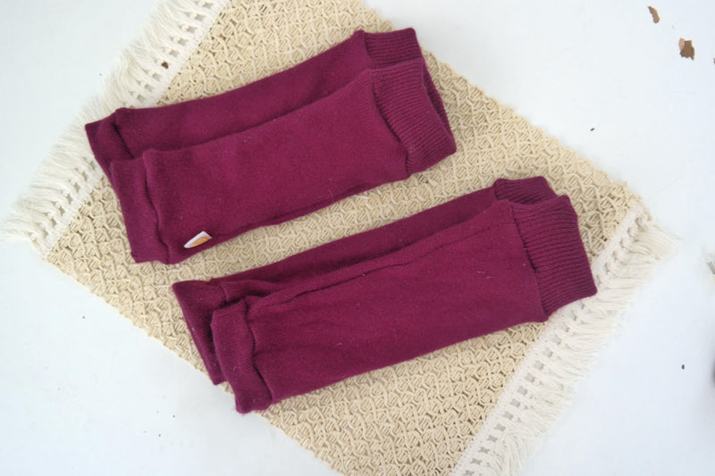 Leg warmers for babies made from upcycled cashmere in plum purple