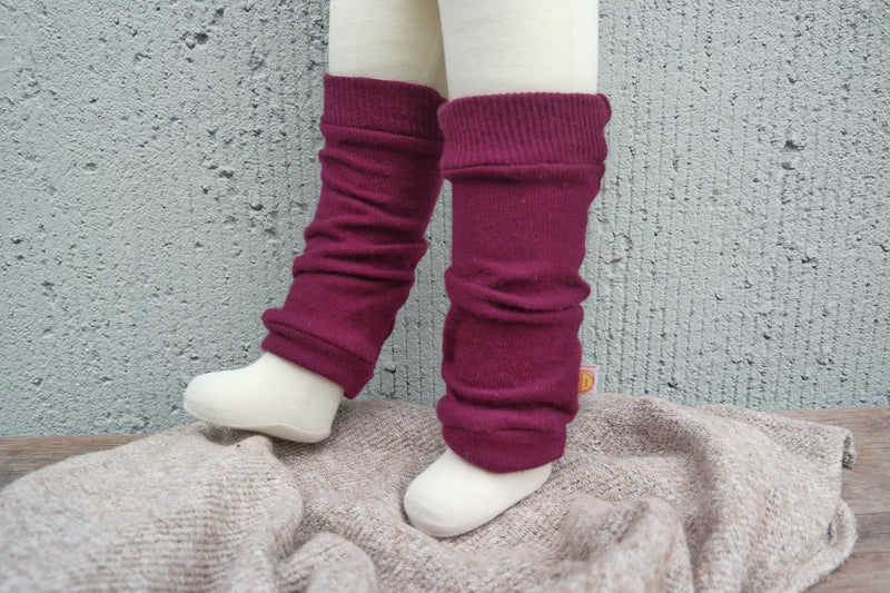 Leg warmers for babies made from upcycled cashmere in plum purple