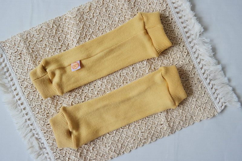 Leg warmers for babies 6-12M made of upcycled silk and cashmere in sunflower yellow