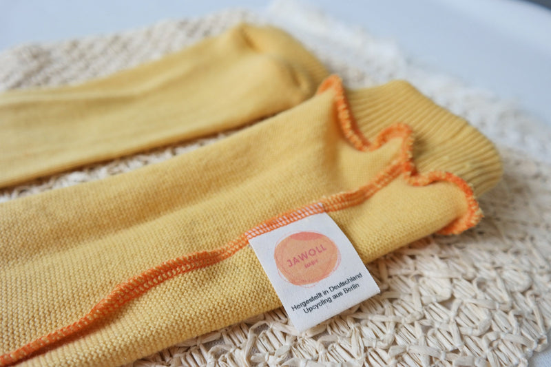 Leg warmers for babies 6-12M made of upcycled silk and cashmere in sunflower yellow