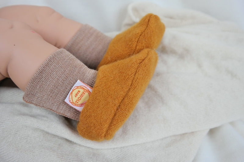 Warm baby shoes made from upcycled wool in mustard yellow &amp; beige