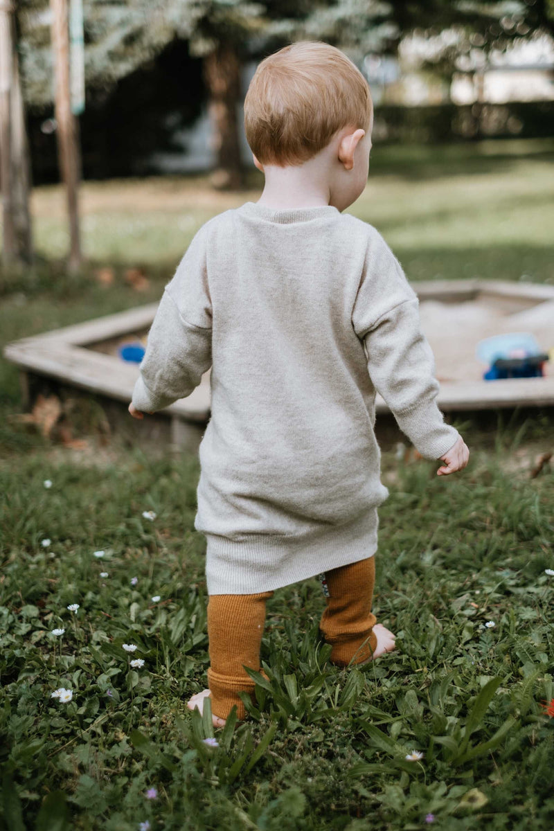 Unisex long-sleeved dress for babies and toddlers made from upcycled wool or cashmere in the color of your choice