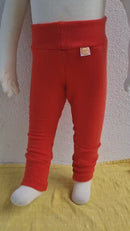 Growing pants for babies and toddlers 74/80 made from 100% upcycled cashmere in coral orange