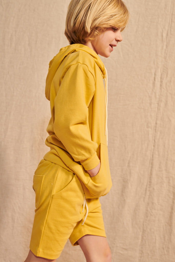 Lenzi Hoody in mustard yellow with small blackberry embroidery for children