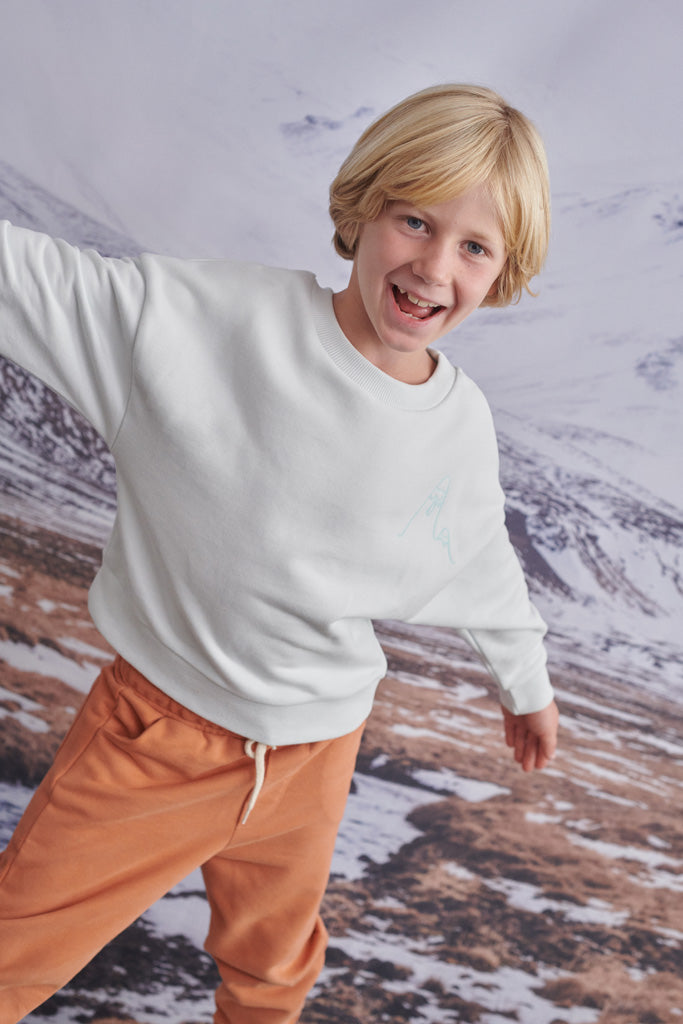 Tara sweater in eisblau mit weinendem Gletscher Stickerei für Kinder